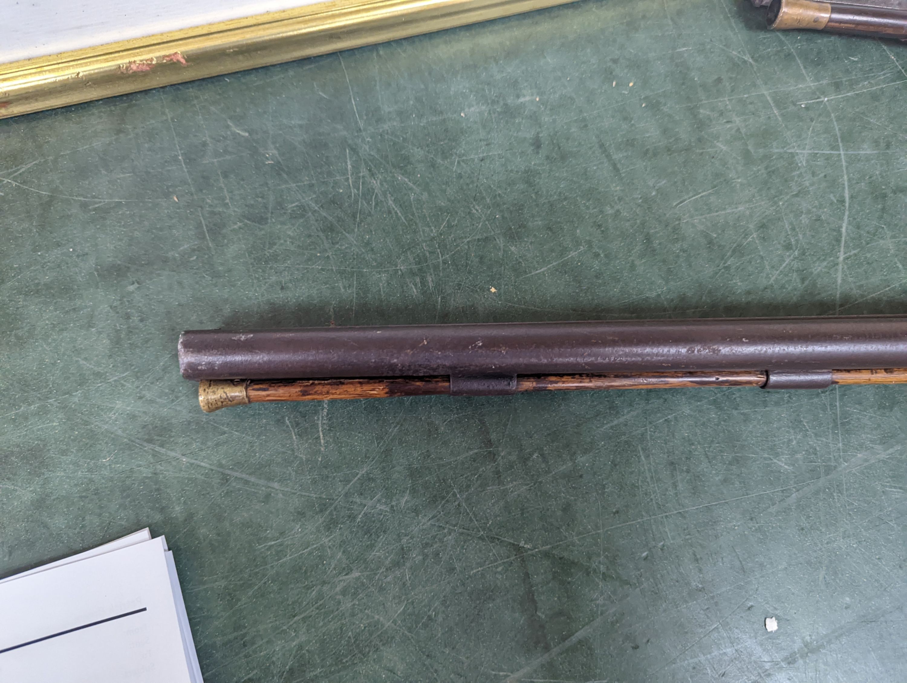 Two 19th century percussion muskets, 103cm. max., one double-barrelled